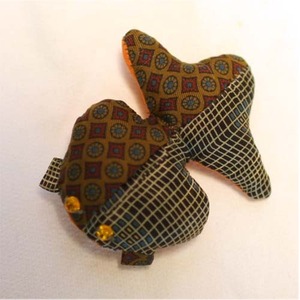 Brown Fishes with orange eyes brooch by Mathilde